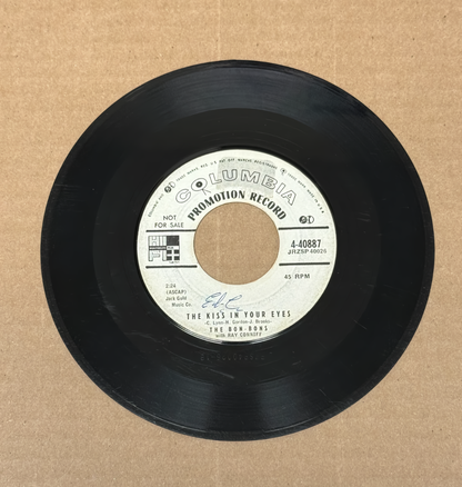 The Bon-Bons with Ray Conniff – The Kiss In Your Eyes / Love Me Or I’ll Die (7-Inch Vinyl, Single Promo Record, 4-40887)
